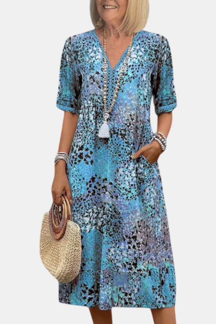 Perla Vestido Boho con Estampado Floral y Detalles en Crochet