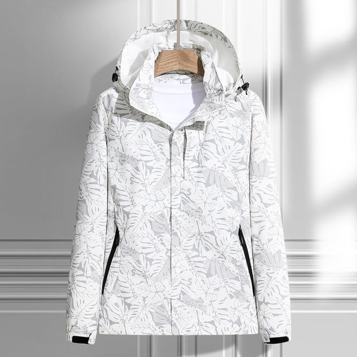 Chaqueta ligera impermeable y cortavientos para mujer, con capucha y patrón de hojas