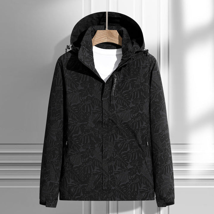 Chaqueta ligera impermeable y cortavientos para mujer, con capucha y patrón de hojas