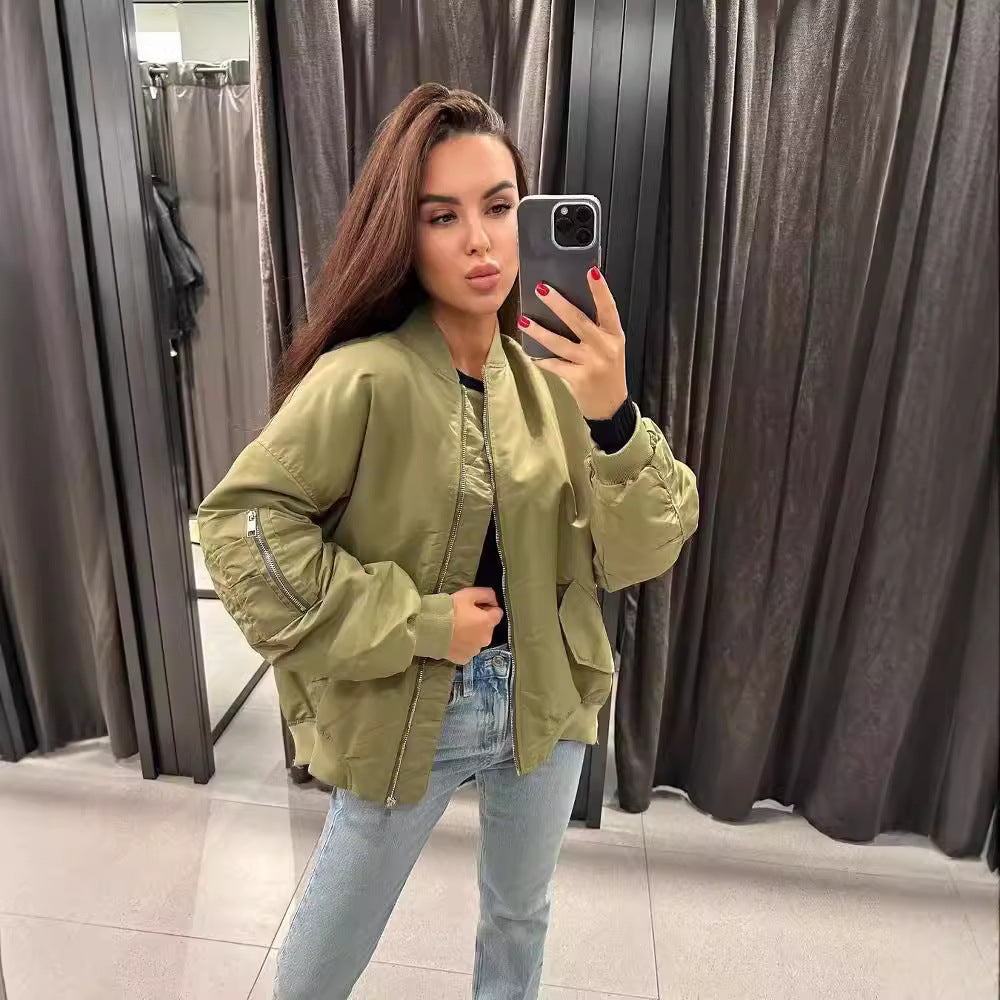 Blusón bomber oversized de señora con bolsos