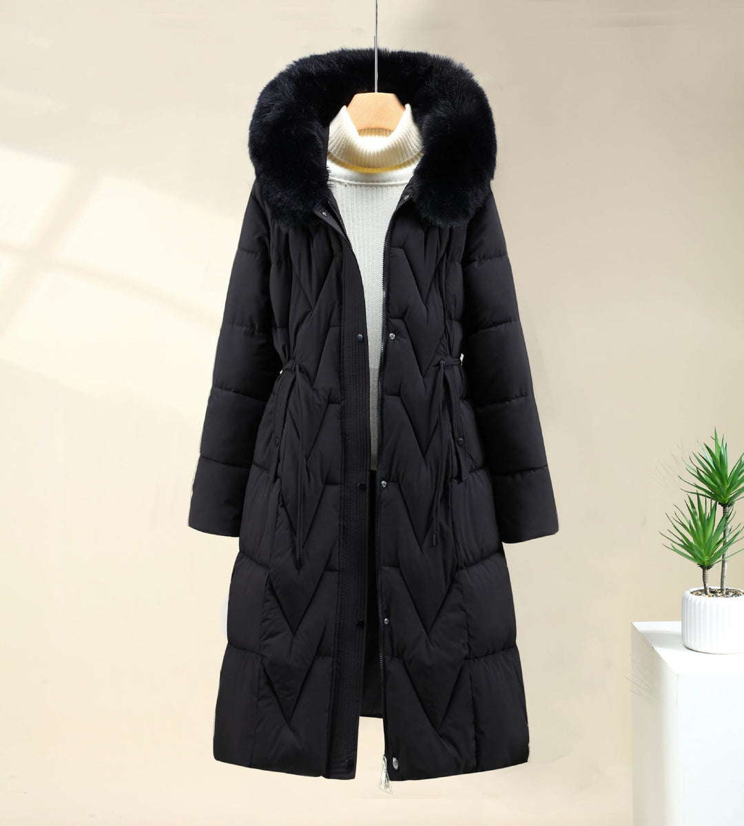 Parka larga de señora con capucha de pelo sintético desmontable y cordón de ajuste