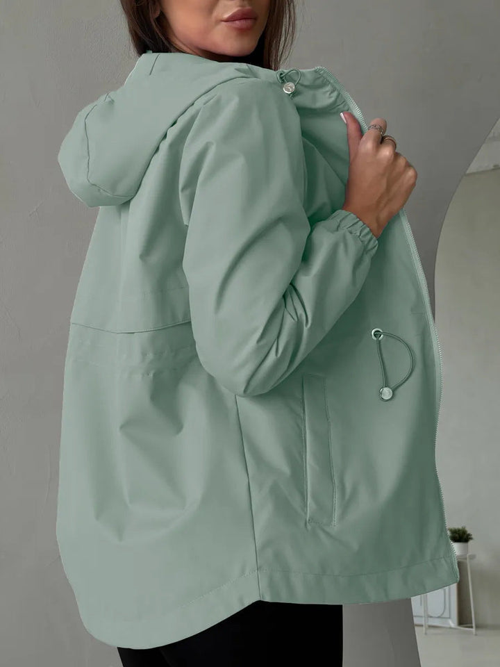 Abrigo exterior para mujer con capucha ajustable y bolsillos espaciosos