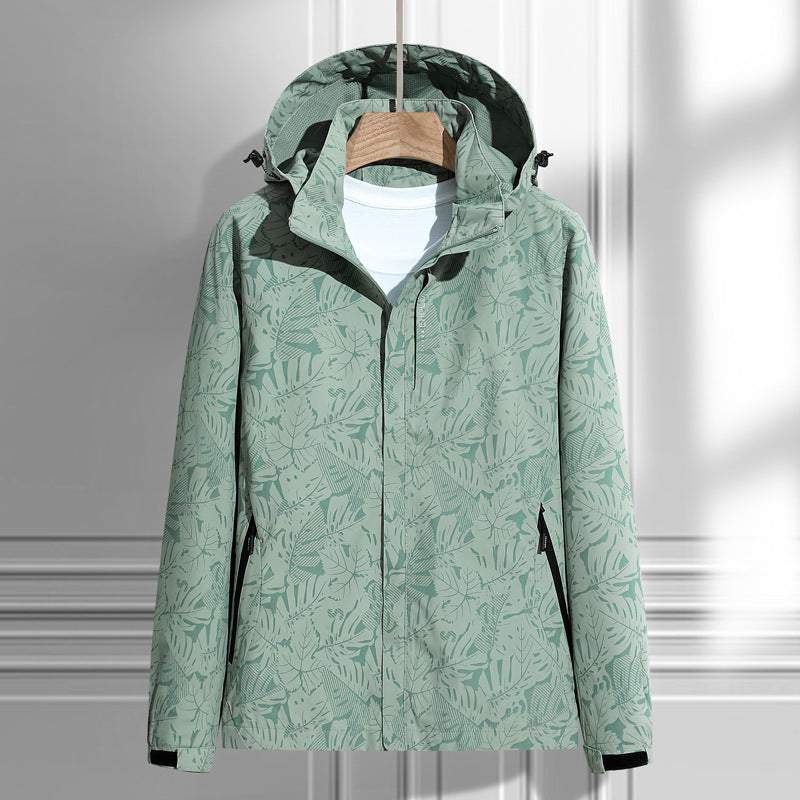 Chaqueta ligera impermeable y cortavientos para mujer, con capucha y patrón de hojas