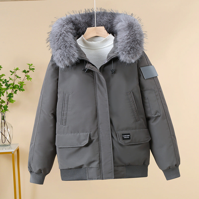 Chaqueta bomber acolchada de señora con capucha de pelo sintético removible y puños acanalados