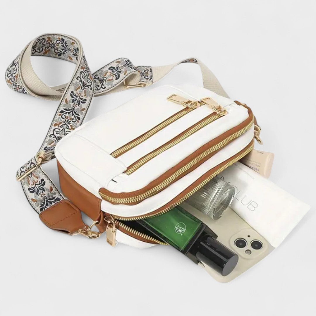 Olivia - Bolso bandolera con correa estampada