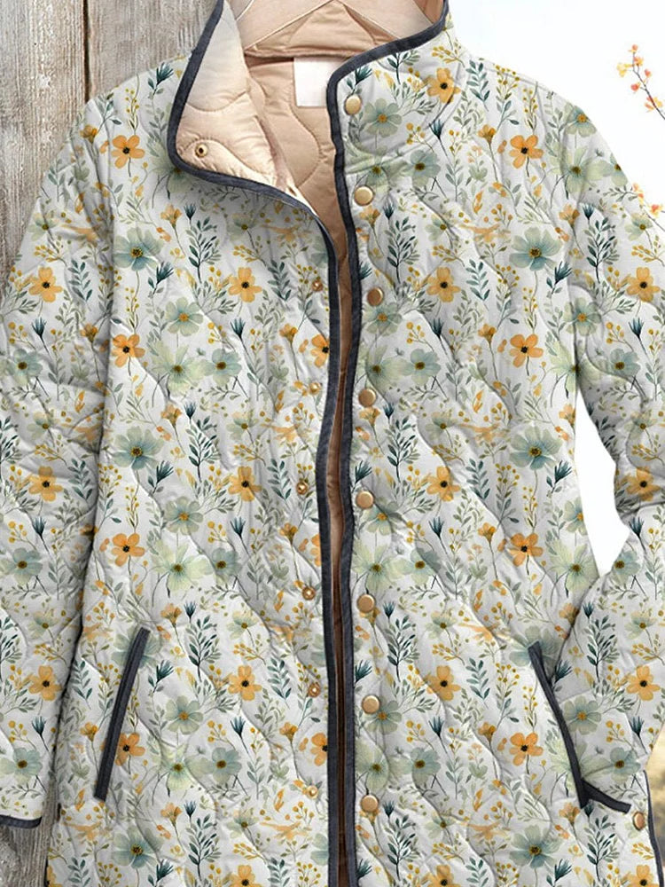 Lindo estampado floral en un abrigo acolchado casual para mujer