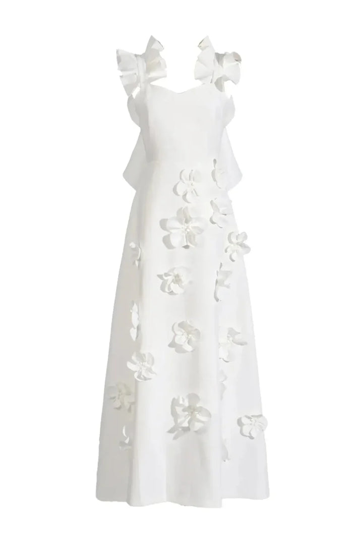 Elina – Vestido maxi blanco con flores 3D y mangas de volantes