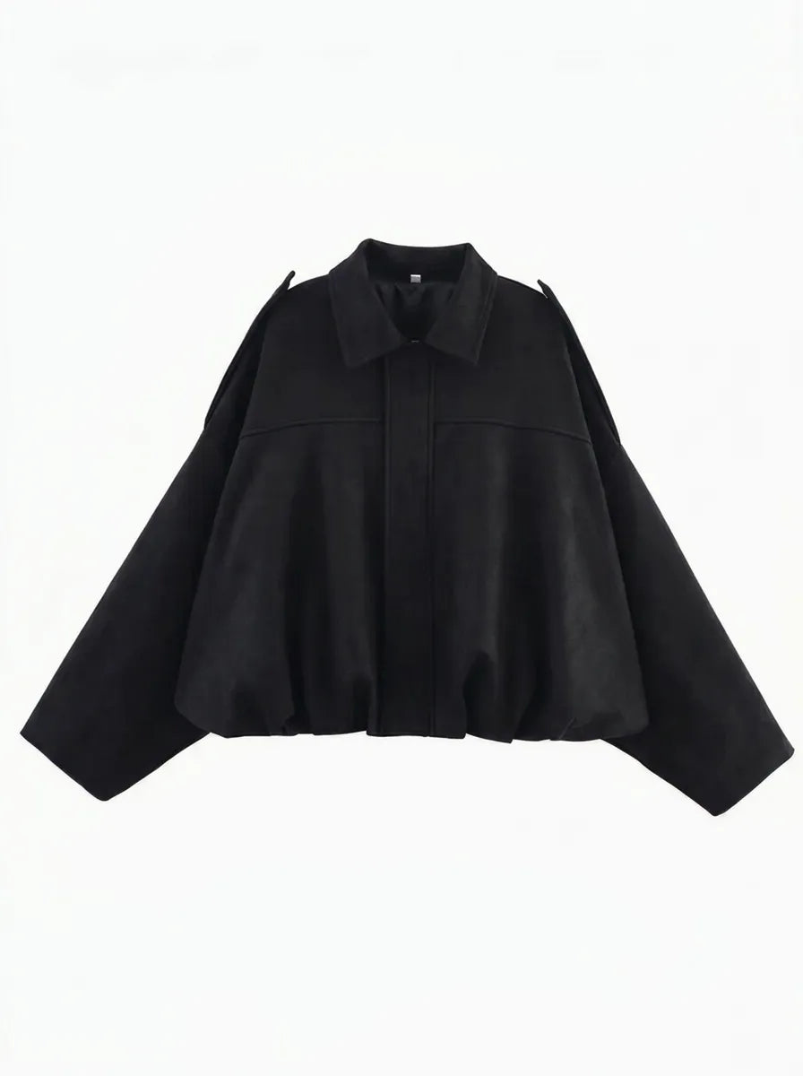 Abrigo oversized de señora con bolsillos prácticos