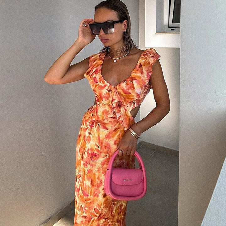 Liora – Vestido maxi femenino con volantes y recortes en estampado acuarela