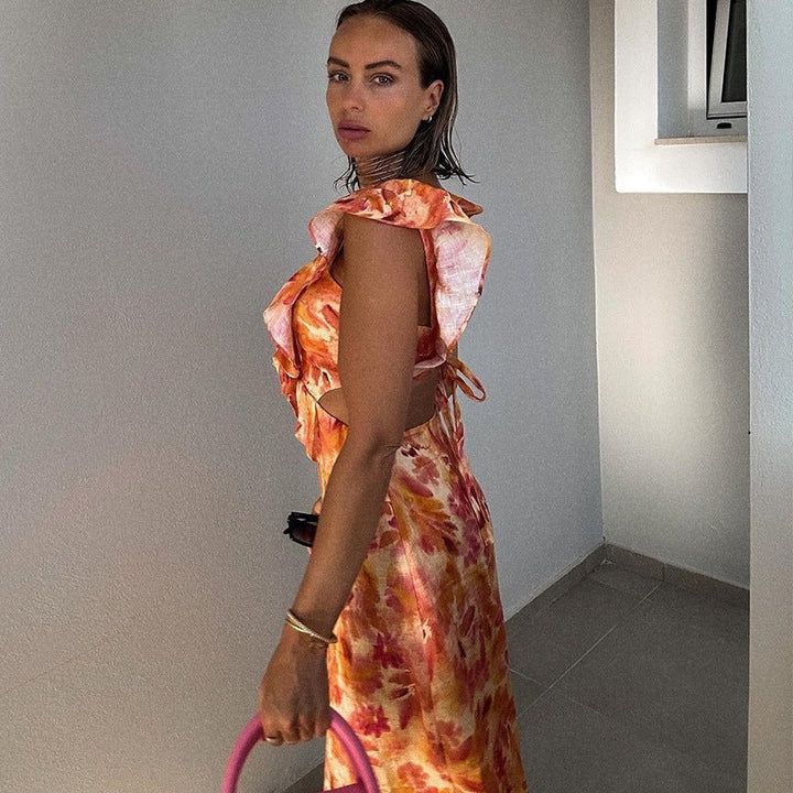 Liora – Vestido maxi femenino con volantes y recortes en estampado acuarela