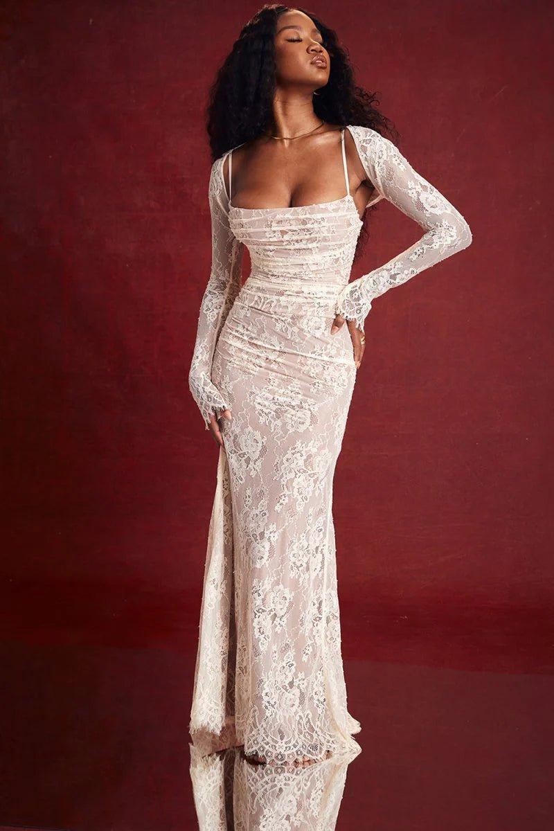 Noa – Vestido maxi de encaje con mangas largas y detalles transparentes