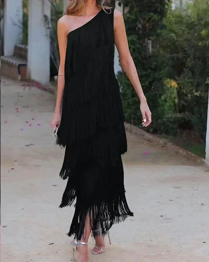 Vestido maxi de mujer con flecos y escote asimétrico