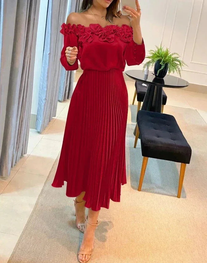 Vestido maxi rojo sin hombros con volantes y falda plisada