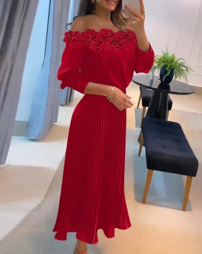 Vestido maxi rojo sin hombros con volantes y falda plisada