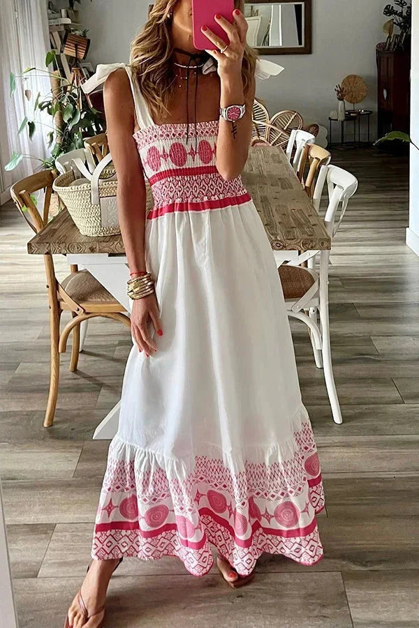 Vestido maxi blanco con patrones de rosas y escote cuadrado