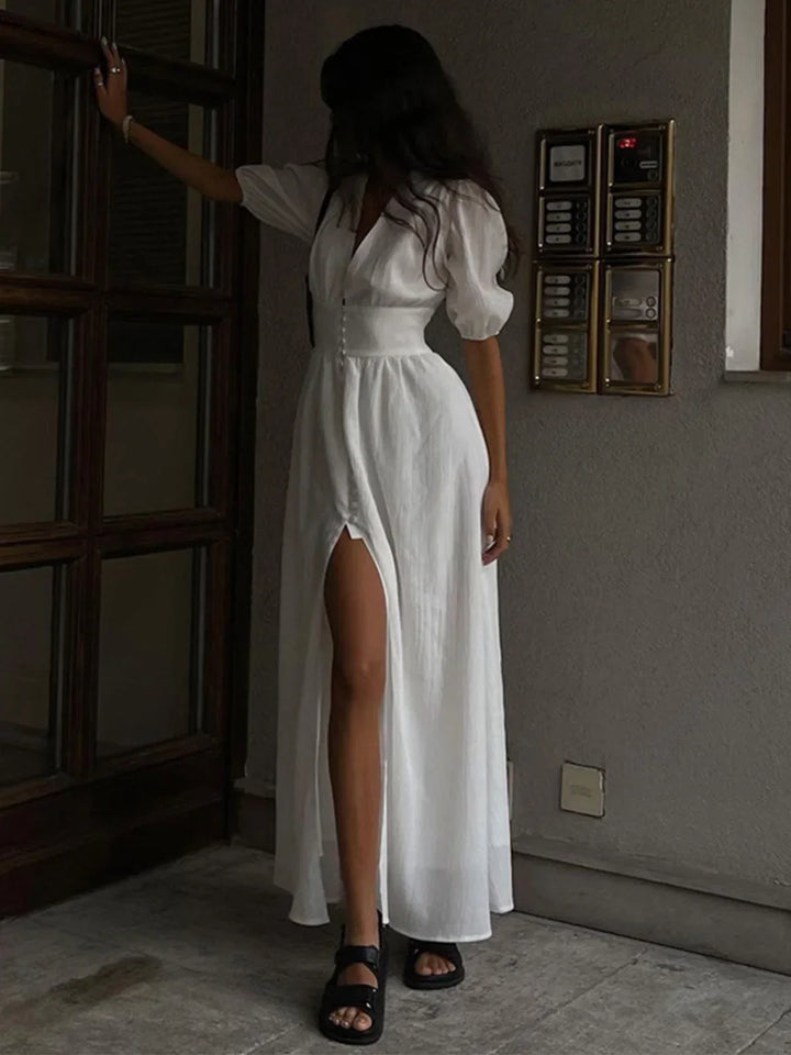 Vestido maxi ajustado con botones y mangas abullonadas