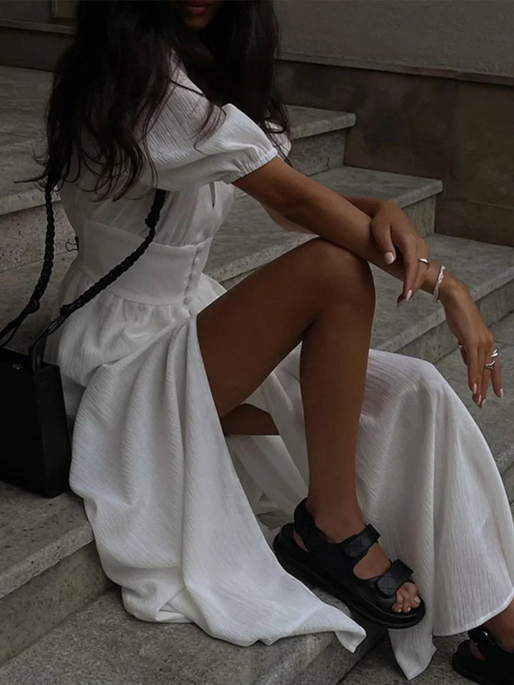 Vestido maxi ajustado con botones y mangas abullonadas