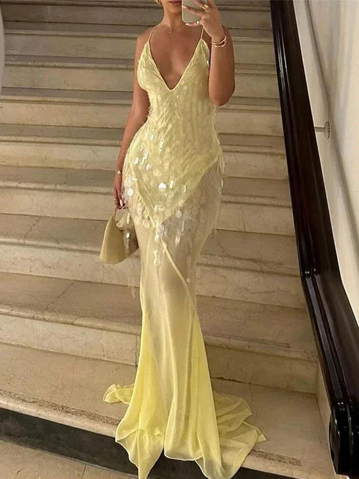 Vestido maxi amarillo con lentejuelas y espalda cruzada en V