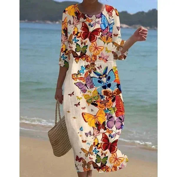 Vestido midi para mujeres con patrones variados, mangas de longitud media, estilo playero