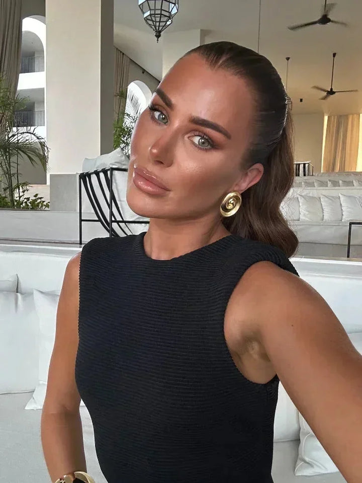 Vestido midi negro sin mangas con flecos